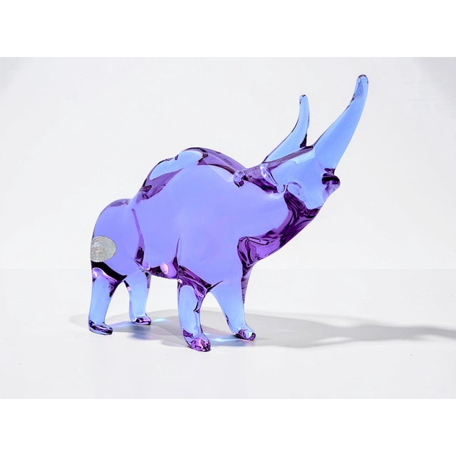 Murano glass sculpture depicting a rhinoceros, vintage, 1960s. This creation, by artist Licio Zanetti, captures attention...