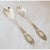 A fine pair of George V sterling silver serving pieces, hallmarked London 1930 and made by **Josiah Williams & Co.**...