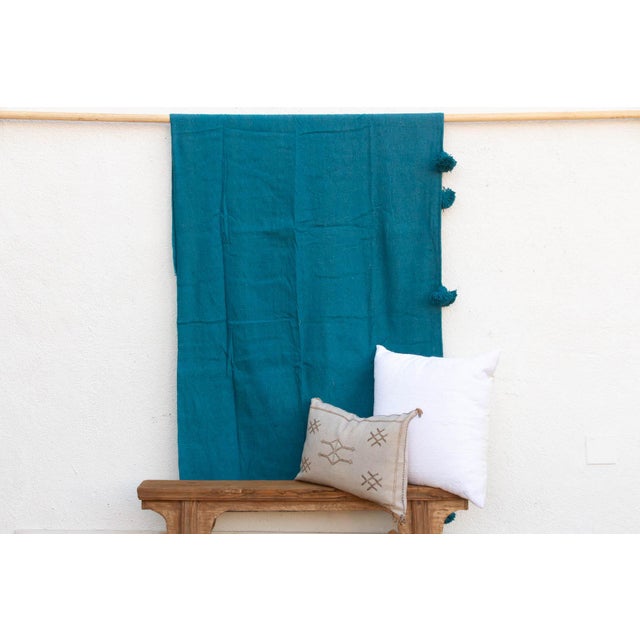 A textile that brings the drama of the Majorelle Garden into the home. This piece is hand-dyed in small batches to achieve...