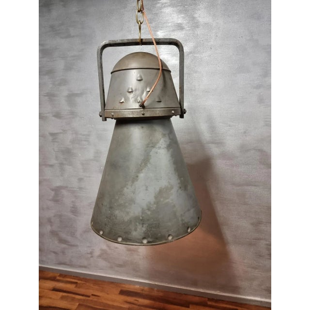 Industrial Tesla Lamp, in Good conditions. Designed 1920 to 1949 This piece is attributed to the mentioned designer/maker....