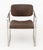 Bauhaus Brown Upholstered Chrome Arm Chair. 30.5" H x 22" W x 21" D; seat: 17.5" H; arms: 24.25" H. Provenance: From a...