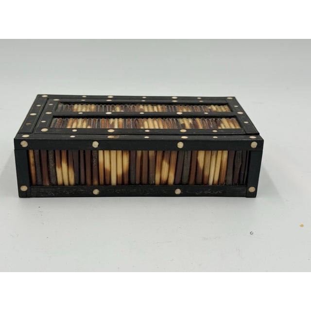 Antique 19th-Century British Colonial porcupine quill and ebony box, made in colonial Sri Lanka. This fine hand crafted...