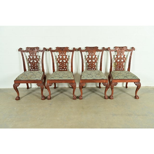 An outstanding set of four Chippendale or Georgian style dining chairs In the manner of Baker Furniture USA, Circa 1980s...