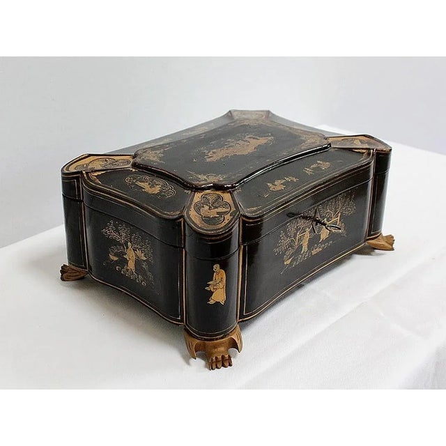 Nice Box of Rectangular section, in Black Lacquered Wood, designed in the Asian taste in the current of the XIXth century....