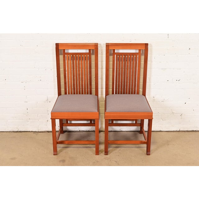 An exceptional pair of Arts & Crafts "Coonley 2" side chairs or dining chairs By Frank Lloyd Wright for Cassina (signed...