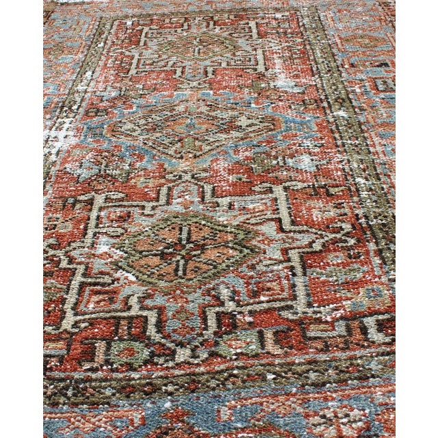 Textile Distressed Antique Persian Karadjeh Rug With Geometric Medallions and Accents For Sale - Image 7 of 13