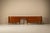 Designed by Giulio Moscatelli for Tonelli e Broggi, this original wood, brass and Carrara marble sideboard desk was...