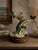 Beautiful vintage dolphin sculpture featuring two gracefully leaping dolphins above stylized ocean waves. This decorative...