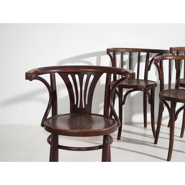 Thonet antique chairs with armrests (c.1920) Dimensions: Part #1: Width: 44 cm Depth: 58 cm Height: 74 cm Seat: 46 cm...