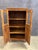Bring organic warmth and functional charm to your space with this beautiful vintage solid wood cabinet. Crafted with a...
