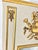 A monumental French Louis XVI style trumeau mirror of exceptional scale and presence, beautifully decorated with a...