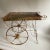 Wonderful vintage rustic metal flower cart. Having two wheels and mesh top