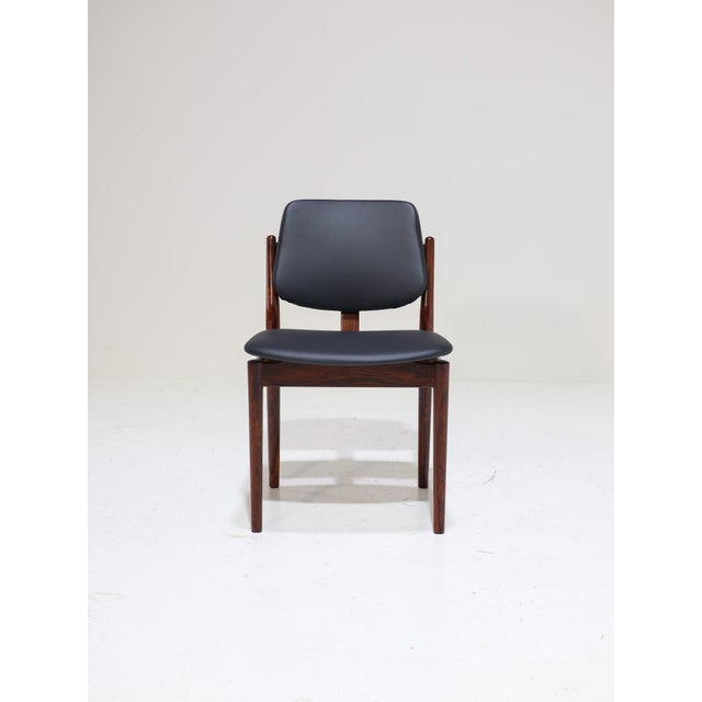 A very rare set of four dining chairs designed by arne vodder for sibast møbelfabrik in denmark, 1960s. The frames are...