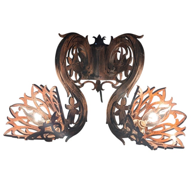 I don't think you'll ever come across a pair of antique carved wood sconces like this one. Very unusual ornate wood wall...