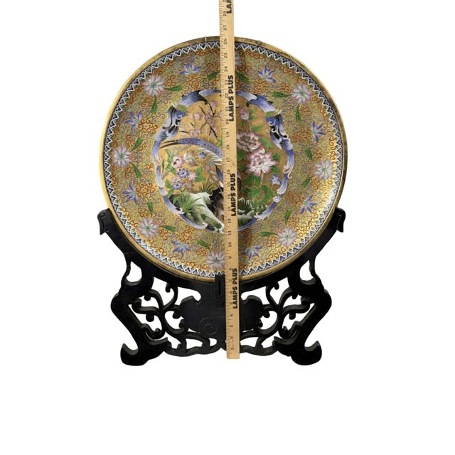 Exceptional large Japanese cloisonné enamel on brass charger featuring a richly detailed phoenix and floral medallion...