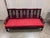 Vintage Chinese solid rosewood three-seat sofa with three hand-carved, pierced dragon medallions set into a key-fret...