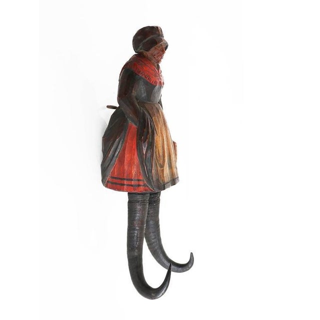 Black forest carved wood coat hooks, late 19th century with genuine chamois horns. Measurements: 13 x 3.9 x 3.9 in / 32 x...