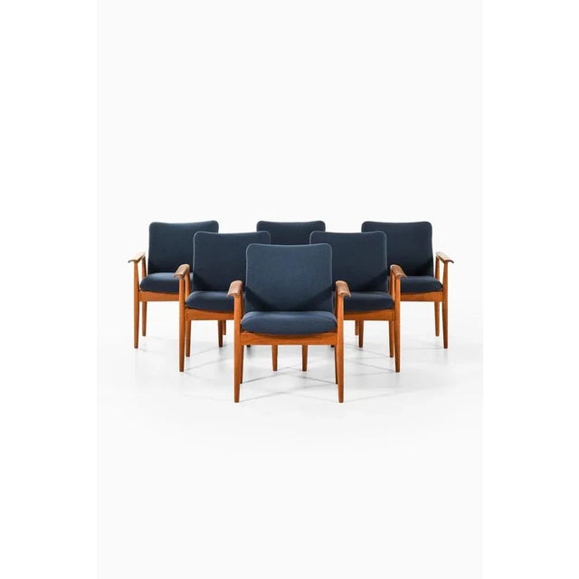 Rare set of 6 armchairs model FD 209 / Diplomat chairs designed by Finn Juhl. Produced by Cado in Denmark. This piece is...