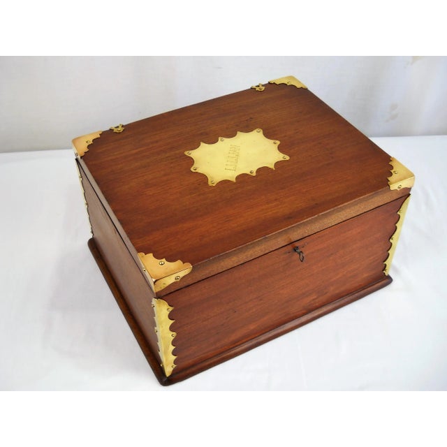 Late 19th-C. wood box with beautiful decorative brass edges and a name plate engraved "Lillian" on top. The box appears to...