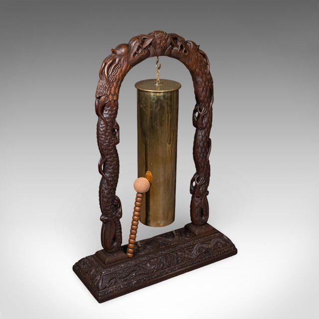 This is a large vintage alarm gong. An Oriental, carved hardwood stand with German brass gong, dating to the Art Deco...