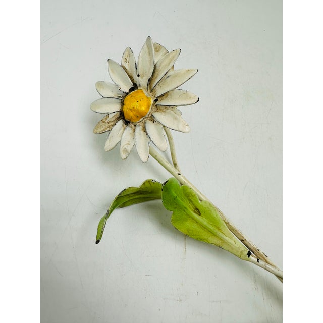 This vintage tole candle snuffer is a charming and delicate piece crafted in the style of traditional toleware, which...