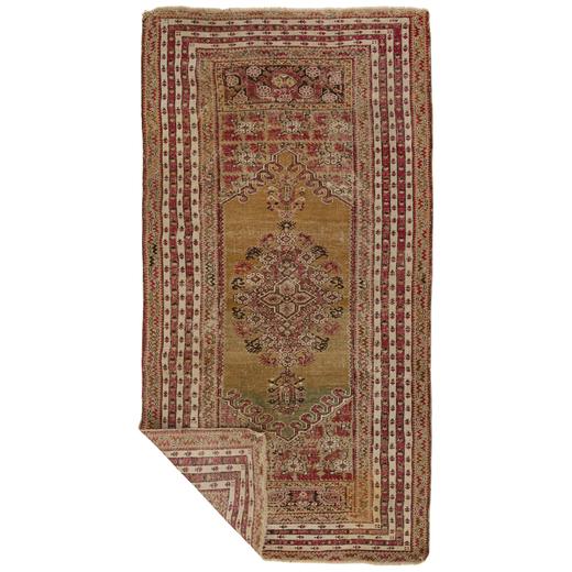 Hand-knotted in wool, this 4x7 antique Turkish Ghiordes rug from circa 1850 represents a classic example of Anatolian...