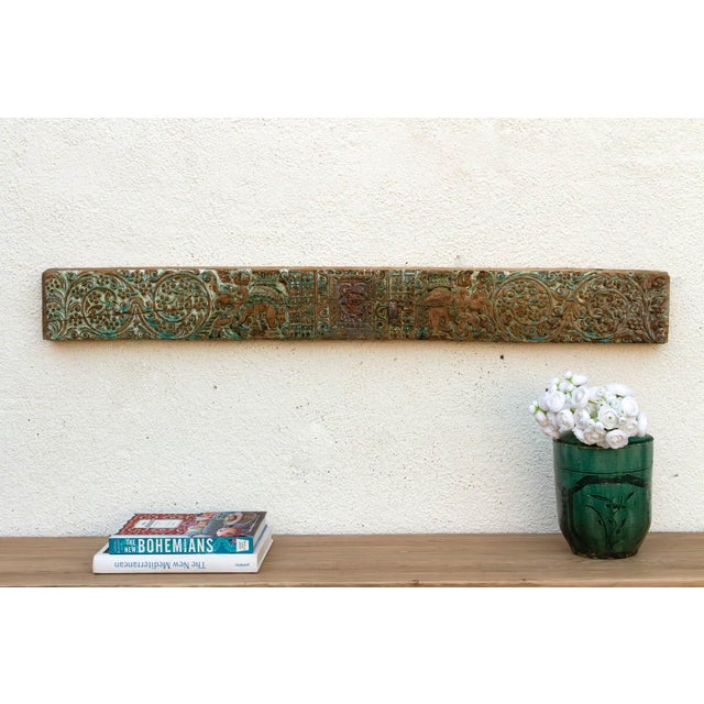 The Verdigris Lintel is a high-energy sculptural fragment that brings a splash of antique color to the architectural...