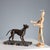 Bronze dog on black marble base. This piece is attributed to the mentioned designer/maker. It has no attribution mark and...