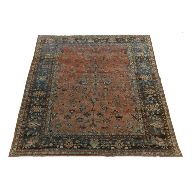 Elegant antique Persian Mahal rug, hand-knotted in wool with a muted red field and intricate floral-geometric motifs in...