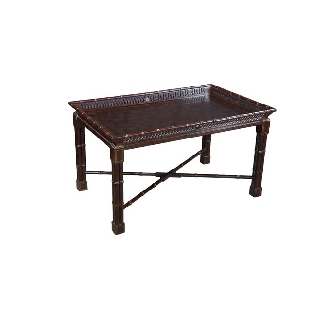 This exquisite John Widdicomb butler's tray coffee table, designed by the legendary "Prince of Chintz" Mario Buatta, is a...