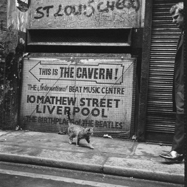 The Cavern Club A sign pointing to The Cavern Club, 'The Birthplace of the Beatles', at 10 Mathew Street in Liverpool, UK,...