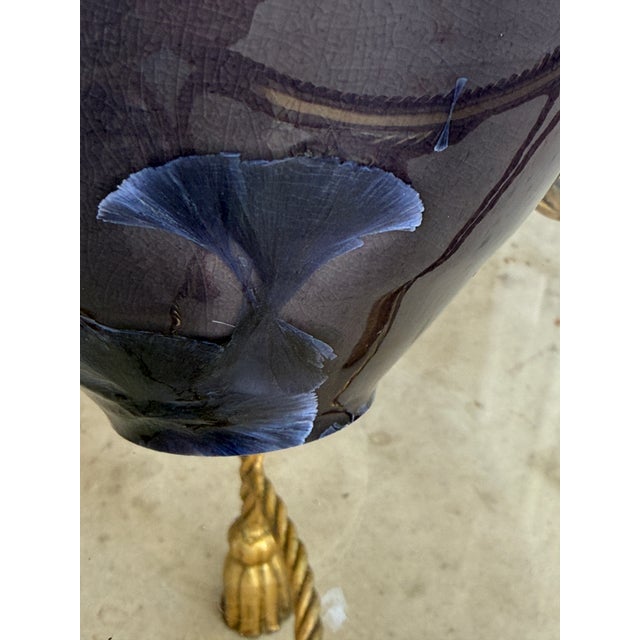 Exceptional hand-thrown porcelain vase by studio ceramic artist Sid Oakley, featuring a richly layered crystalline glaze...