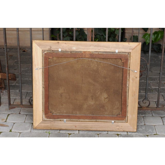 An English oil on canvas still-life painting from the early 20th century, by Elinor Jones and set inside a giltwood frame....