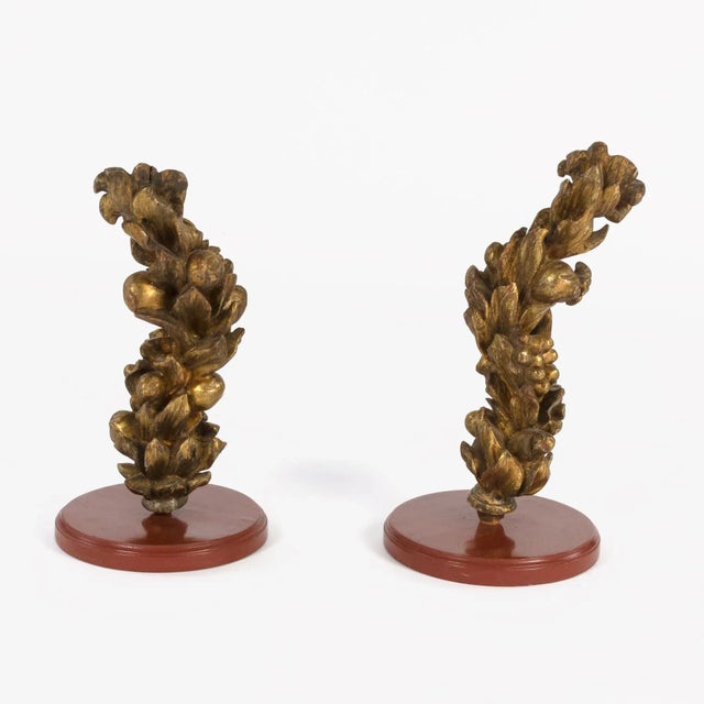 Pair of 18th century carved giltwood architectural elements depicting fruit, flowers, thistle and berries; Italian circa...