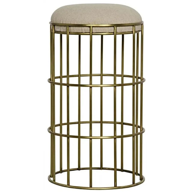 A glamorous look with art deco inspirations, the Ryley stool has a cage like metal base with a burnished gold finish, and...