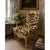 A striking French Regency style armchair, distinguished by its hand-carved giltwood frame and newly upholstered in the...