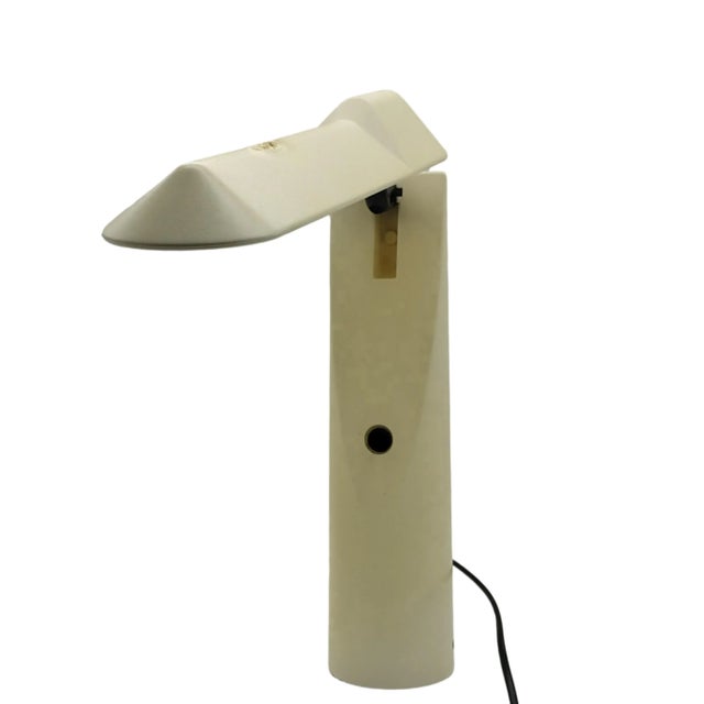 Picchio table lamp by Japanese designer Isao Hosoe and produced by Luxo Italiana in 1984. Elegant and functional table...