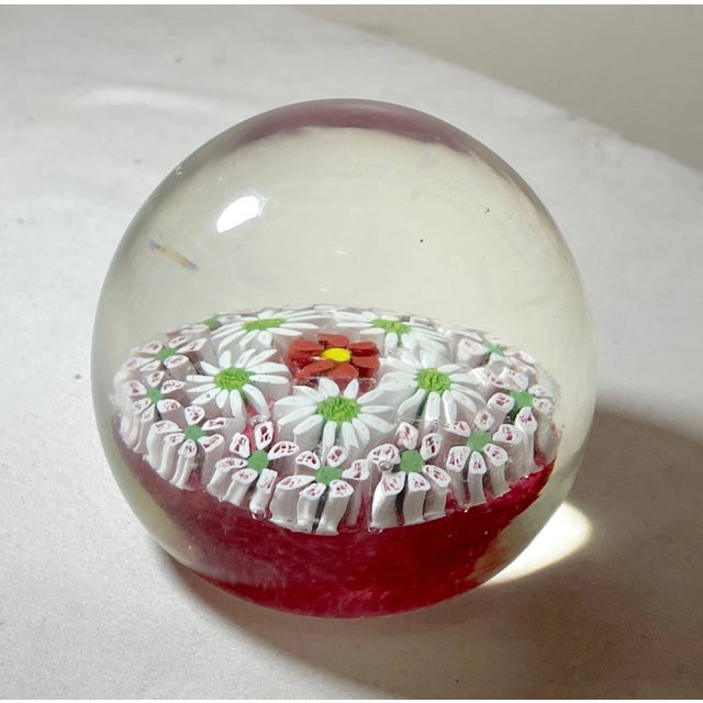 Up for sale is a lovely vintage hand blown Murano Italian art glass paperweight by. It's blown by hand with a mix of...