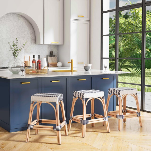 Evoking images of sidewalk tables in the Cote d'Azur, counter stools like this will give your kitchen, dining area, or...