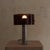A 1972 design by Philippe Rogier for French lighting firm Oxar. Petite in scale at just 11 inches tall, this cylindrical...