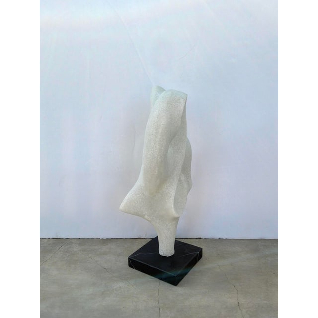 Stylish Revelation Origin Sculpture Man Made Stone on Black base. Showroom Floor Sample.