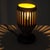 Bring warm, ambient character to your space with this solid wood accent lamp. Expertly turned and carved with a geometric...