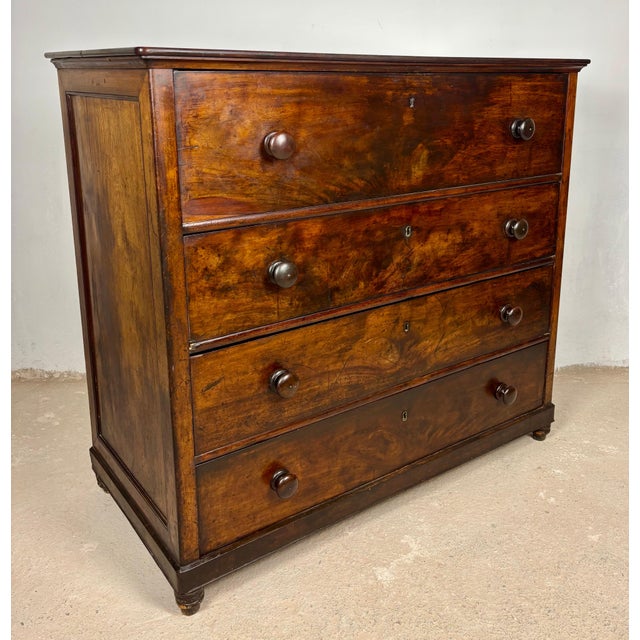 Antique Spanish walnut secretaire chest dating to the late-19th century, combining practical storage with a concealed...