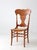 Late Victorian pressed back chair with a beautifully shaped high back and scrolling foliate detail. The warm oak tone...
