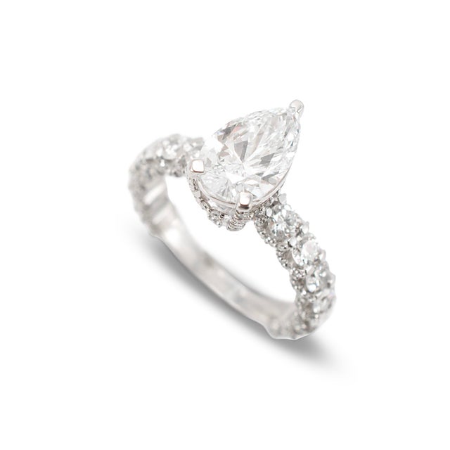 Gender: Ladies Metal Type: 10K White Gold Ring Size: 7.25 Thick: 2.75 mm Head Measures: 11.75 mm by 6.90 mm Weight: 4.05...