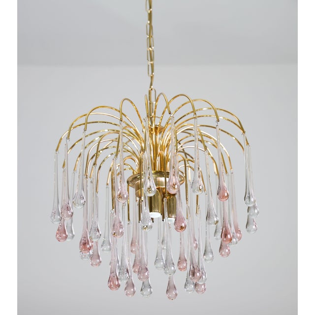 Gorgeous Murano chandelier in the style of Venini La Cascata. The chandelier consists of three rounds composed of...