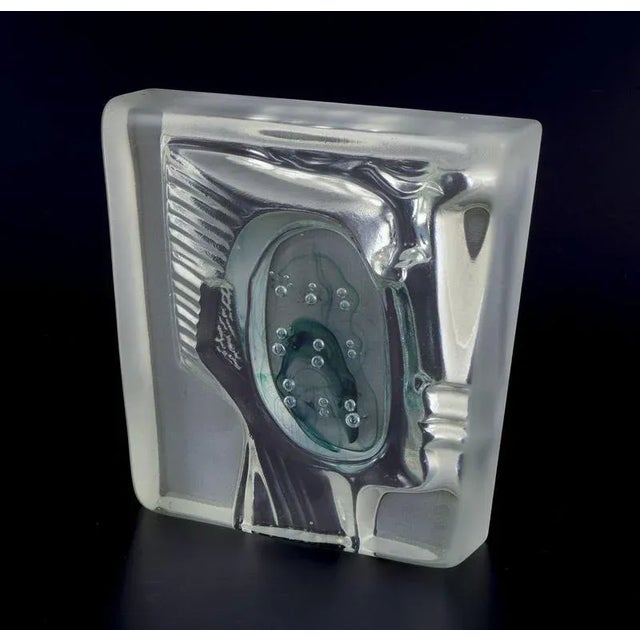 Murano, Italy. Sculpture of art glass. Motif of a woman's face. Unique piece. Clear and green frosted glass. Dating:...