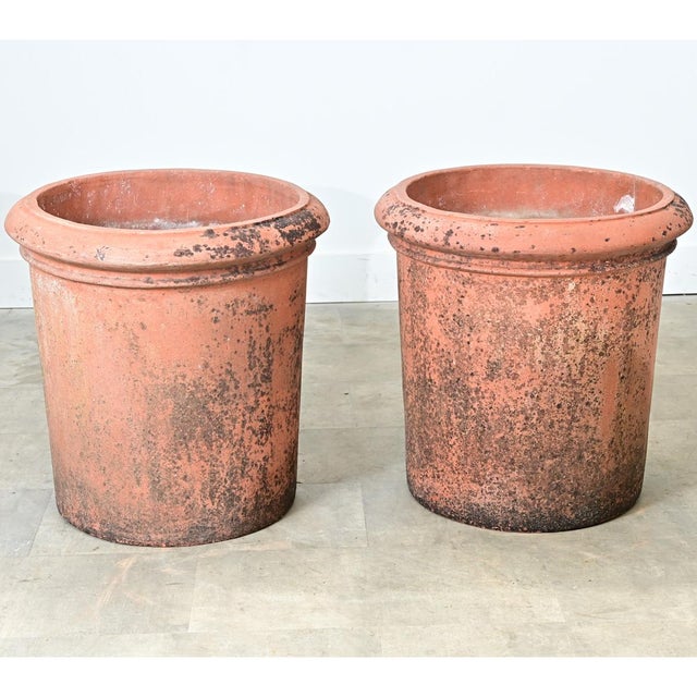An English pair of large terracotta planters, perfect for any courtyard, patio, garden, or greenhouse. These pots are...