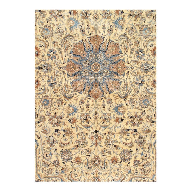 Persian Nain rugs are renowned for their detail and fine use of outlining along the central motifs. Breaking from the...
