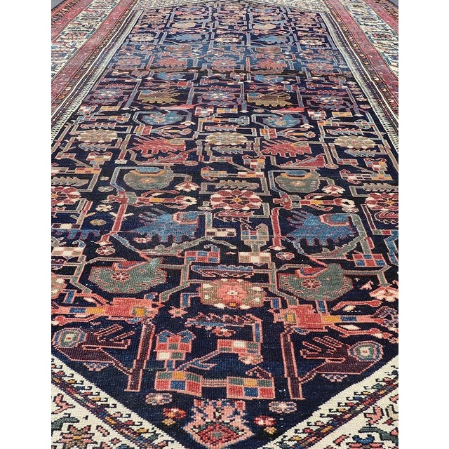 Measures: 6'10 x 12'5. Antique Persian Hamadan Rug with Deep Indigo Field With Tribal Motifs. Keivan Woven Arts / rug...